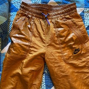 Gold Nike windbreaker joggers